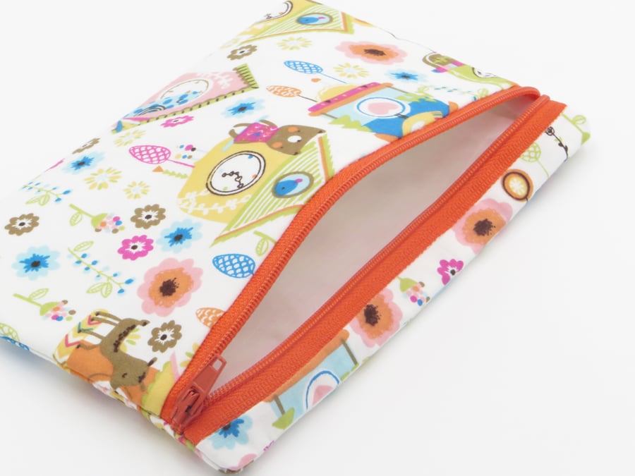 Zipped pouch with waterproof lining, handy little coin purse or storage bag.