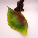 Unique Handmade Fused Glass Cloud Forest Magnolia Leaf Cast Falling on Brickwork