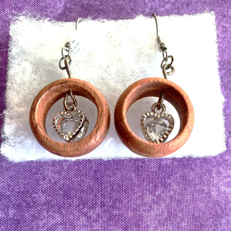 Small wooden hoop earrings with silver and crystal hearts