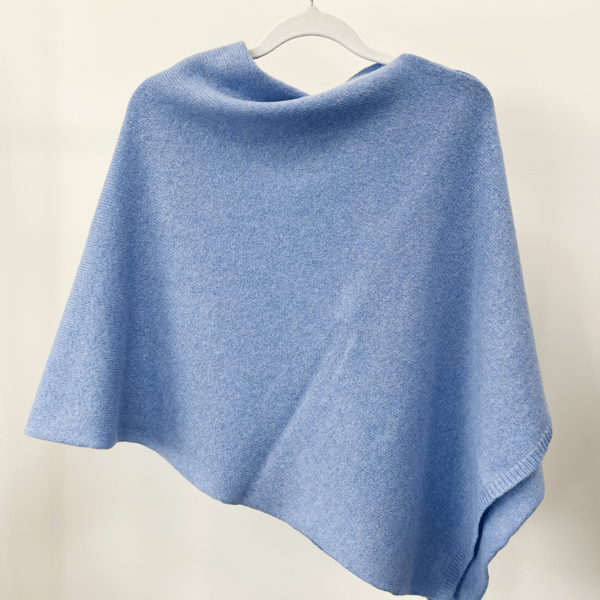 Lambswool knitted poncho - iceberg blue