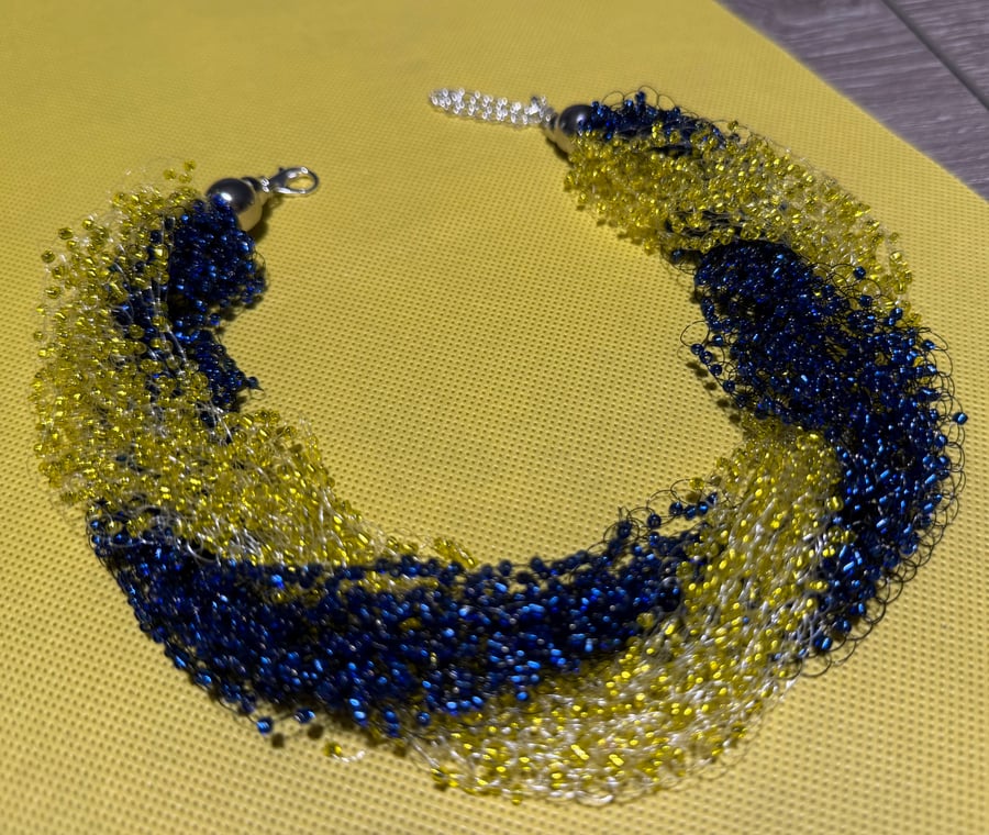 Air Necklace with blue and yellow Beads