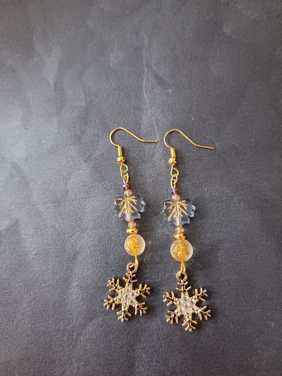Gold beaded snowflake charm dangle earrings 