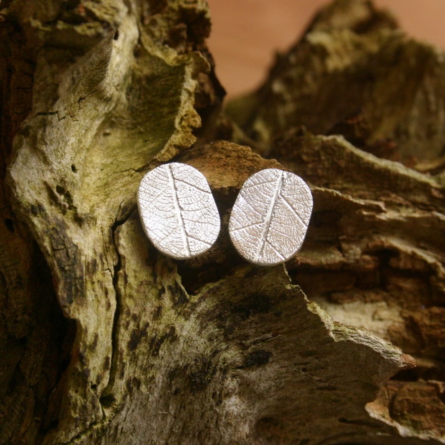 Fine Silver oval stud earrings with skeleton leaf pattern