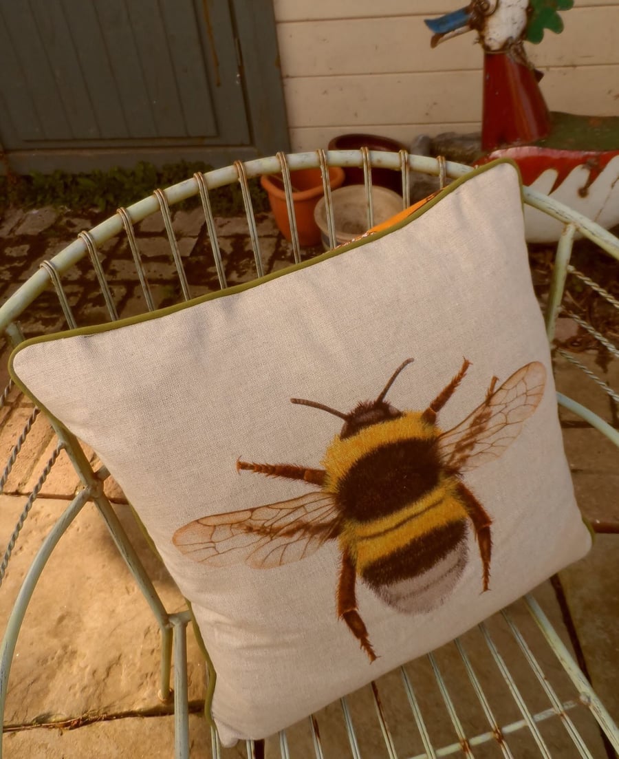 Bee cushion pillow. Brightly coloured cushion in vibrant Spring shades.
