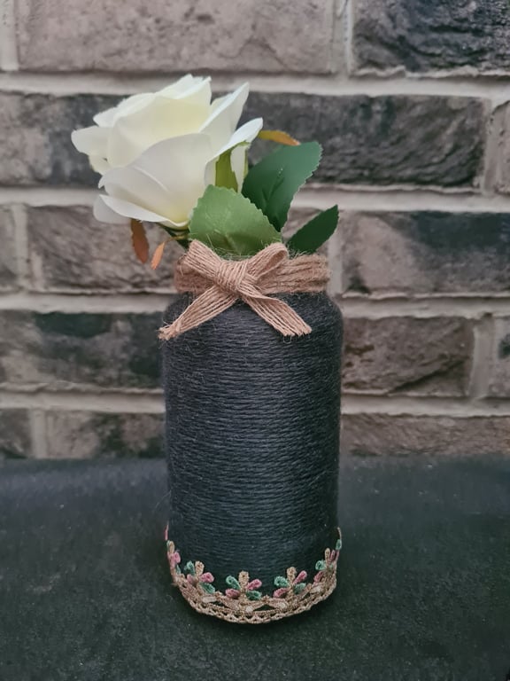 Dark grey yarn wrapped vase with ribbon and jute trim