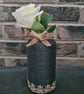 Dark grey yarn wrapped vase with ribbon and jute trim