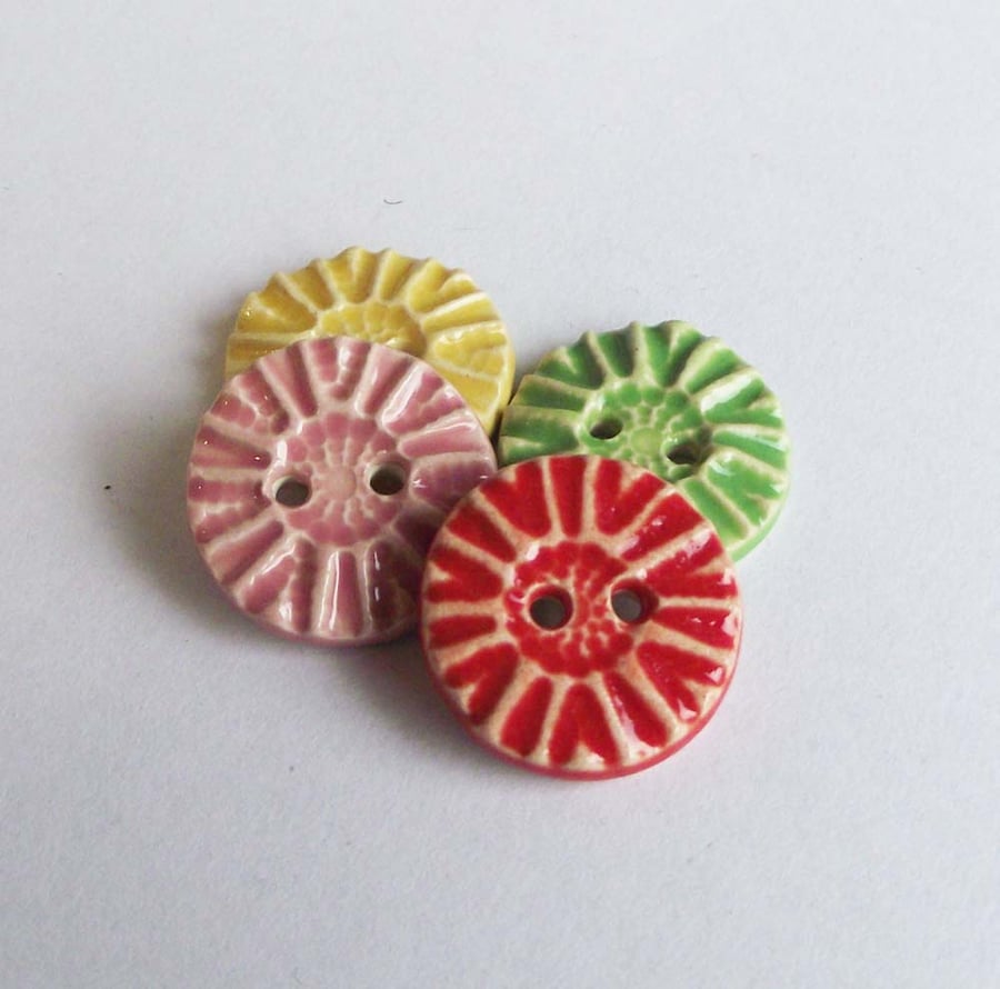 Set of four little handmade ceramic buttons