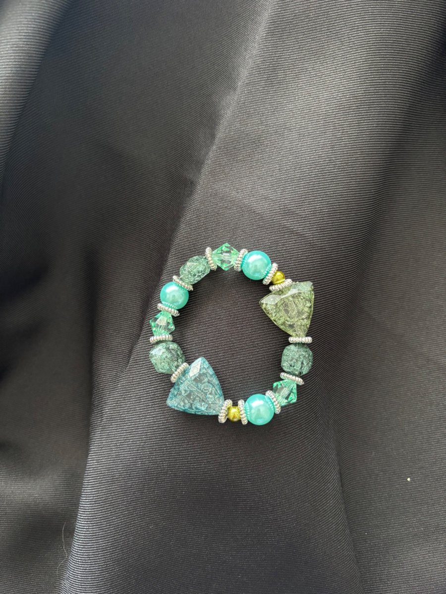 Beautiful handmade bracelet. 18cm. Turquoise tints. 
