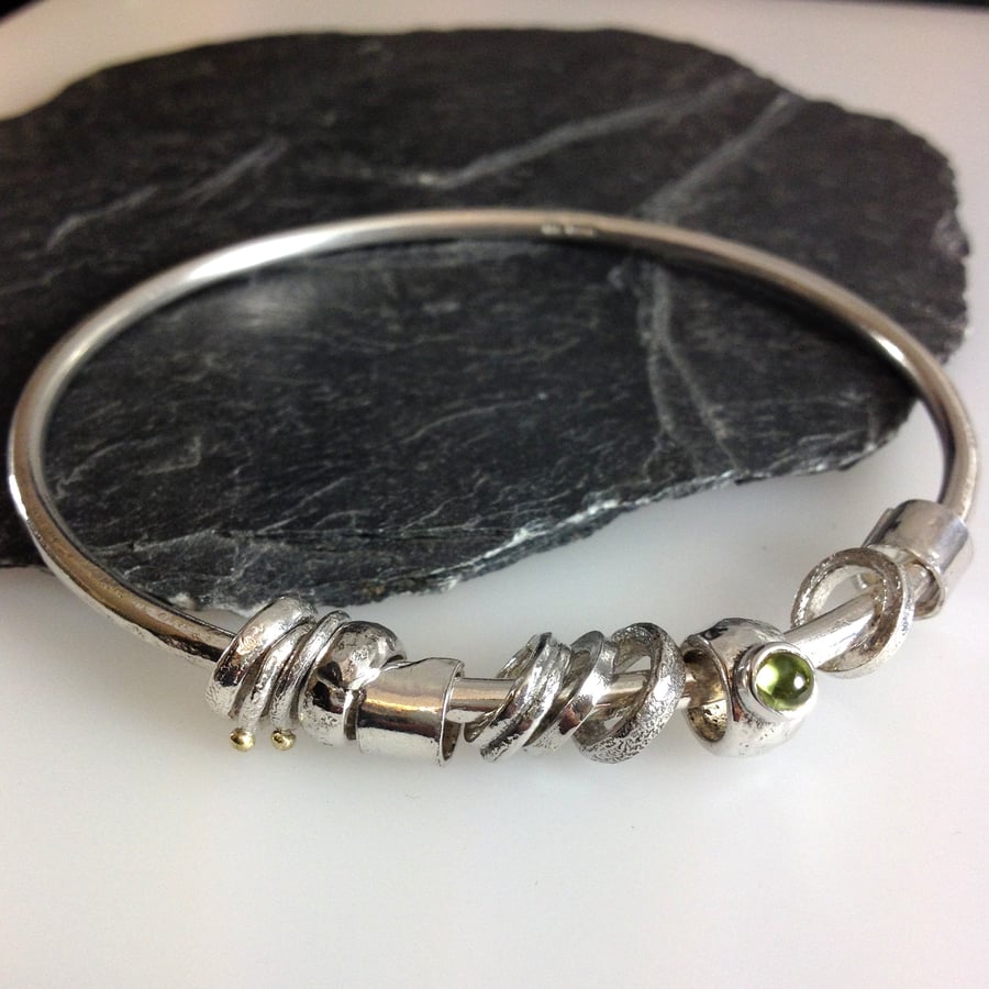  Silver peridot and 18ct gold bangle