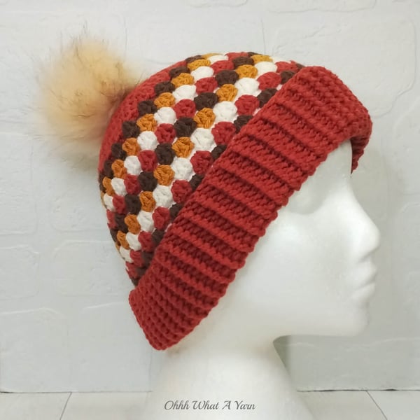 Crochet hat, beanie. Copper, gold, brown and cream granny stitch pom pom hat.