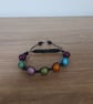 BLACK AND MULTI COLOURED MACRAME BRACELET. - Image 1