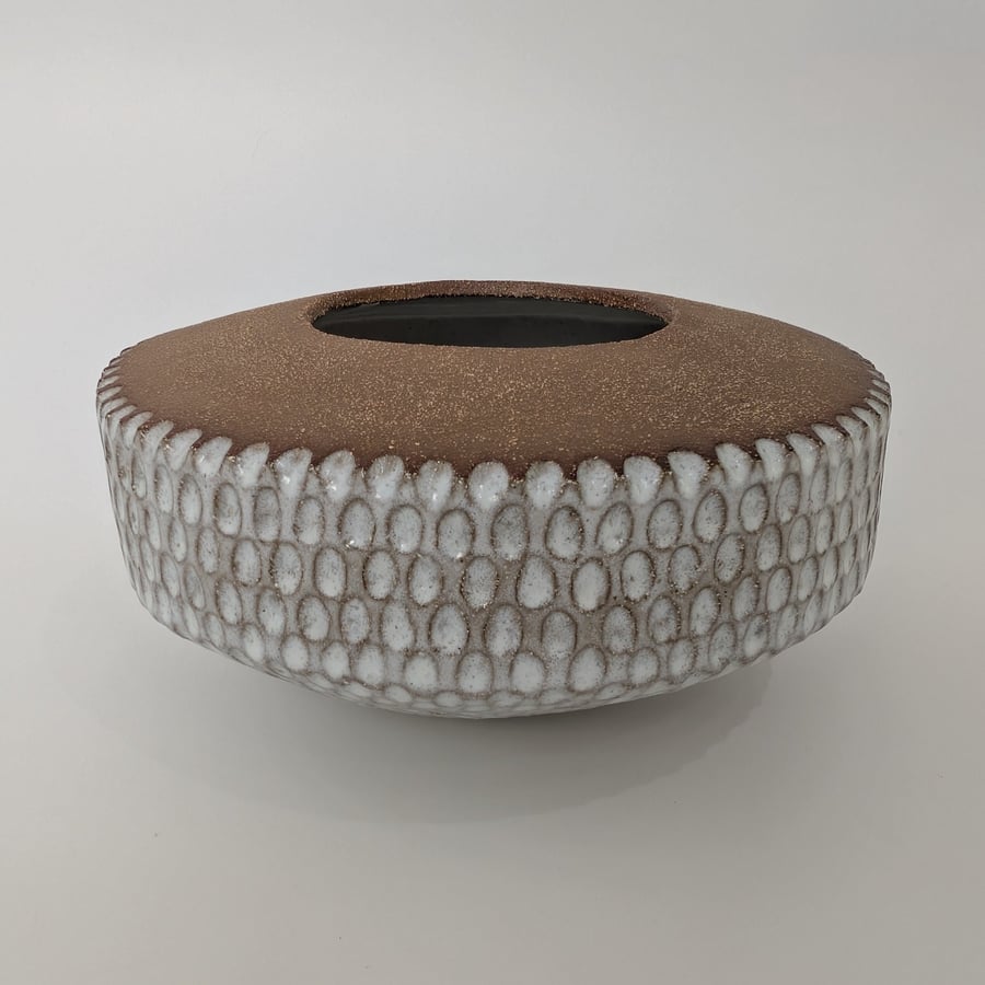 White glazed stoneware decorative bowl.