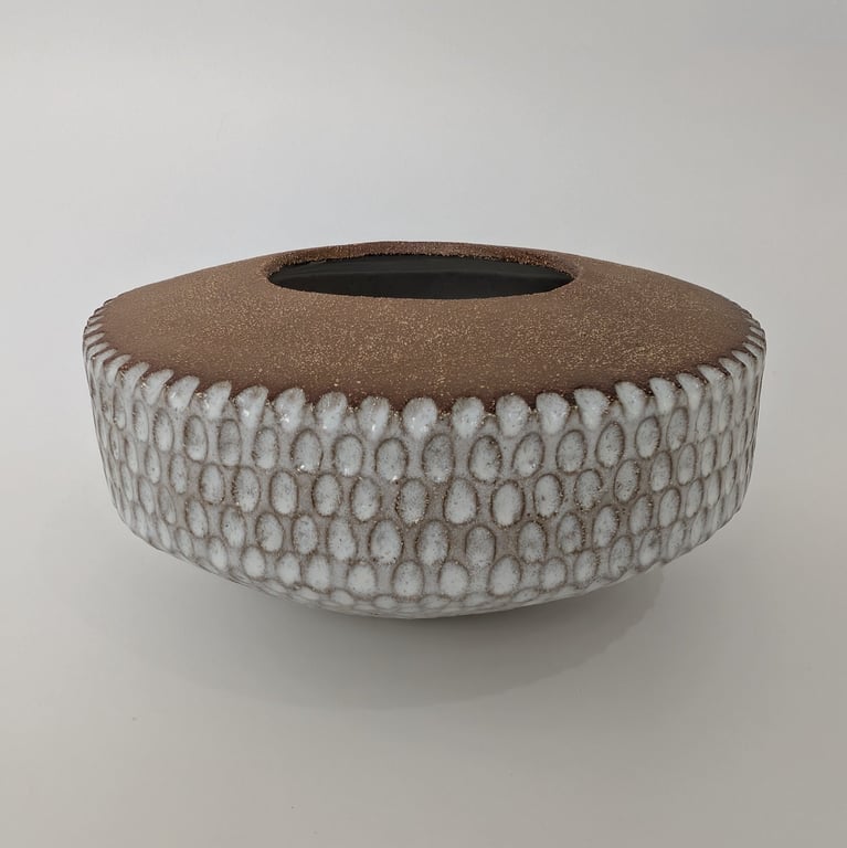 White glazed stoneware decorative bowl.