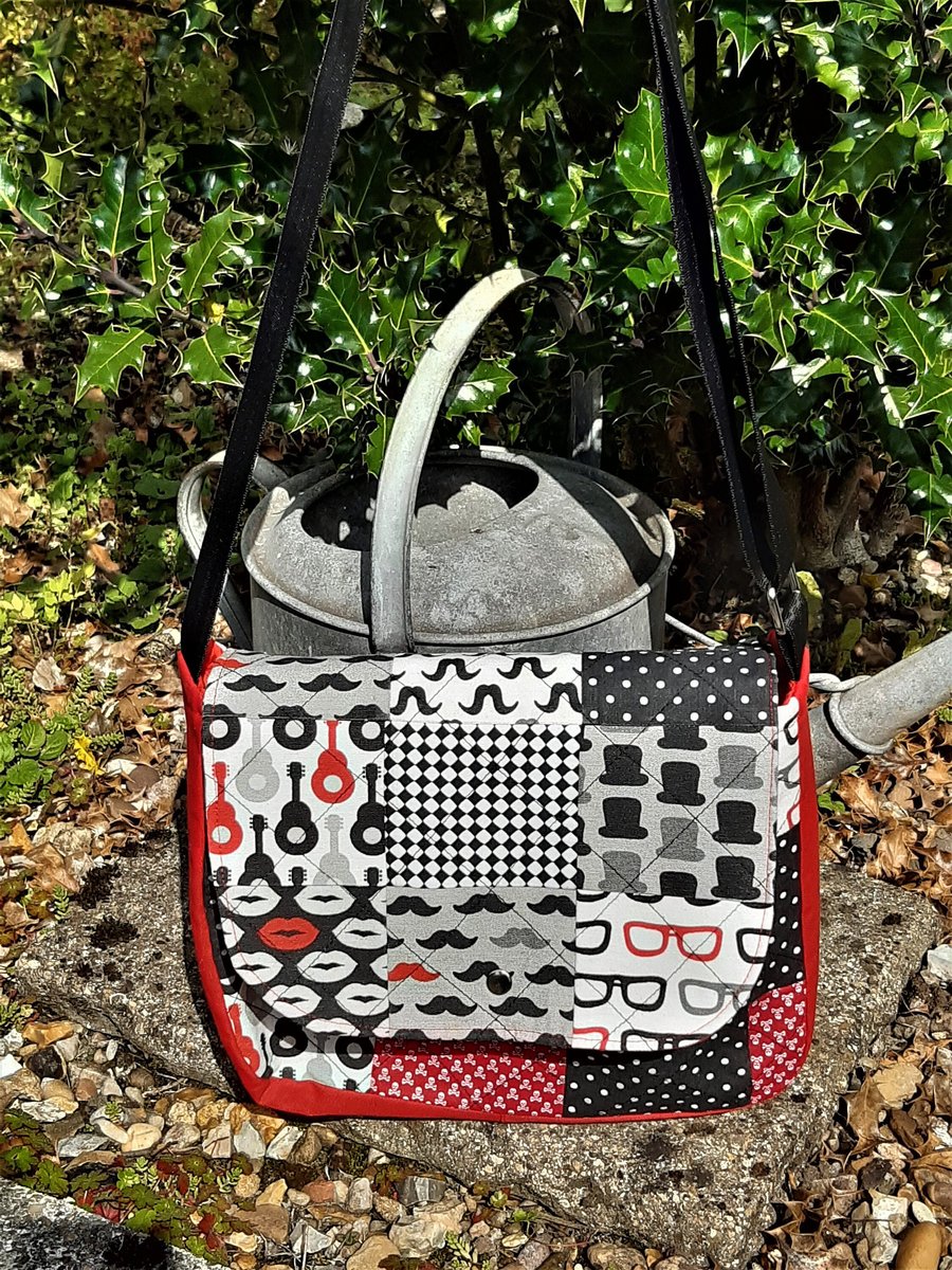 Messenger bag in red, white and black patchwork