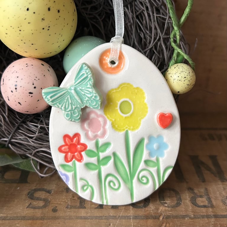 Pottery Easter Egg decoration with butterfly