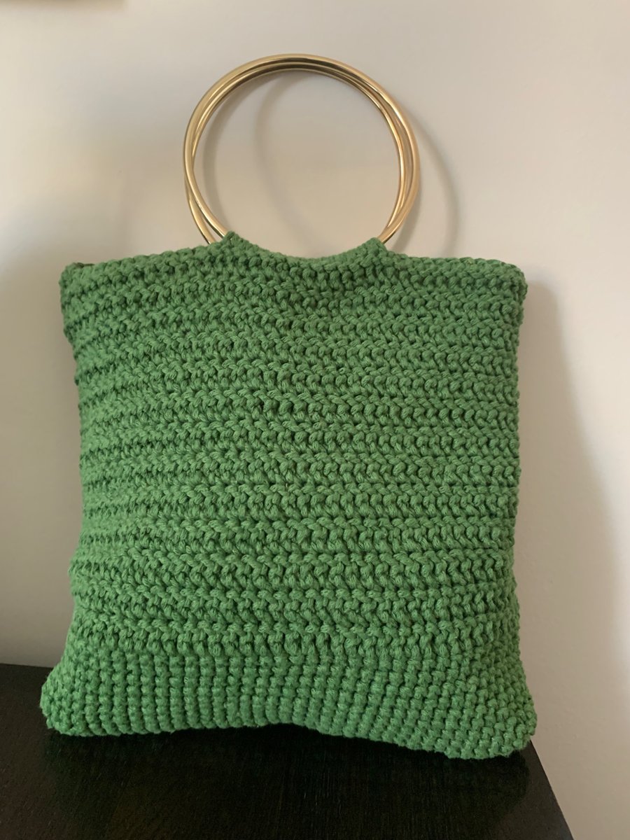 Stylish green crochet handbag