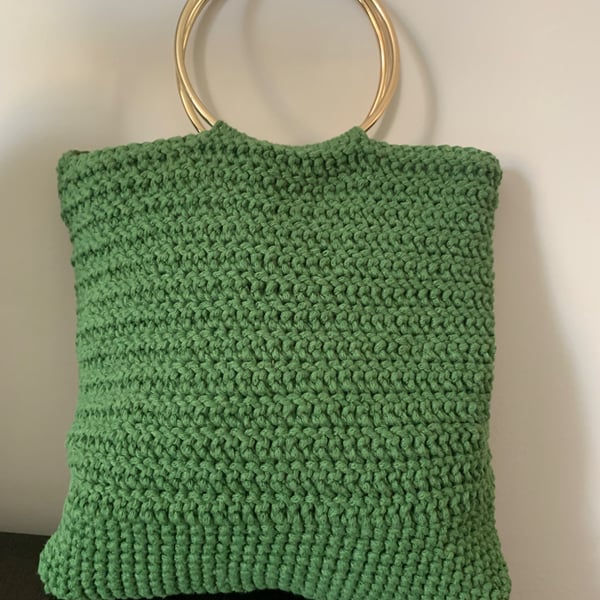 Stylish green crochet handbag
