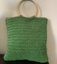 Stylish green crochet handbag