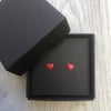 Bright red enamel heart studs. Sterling silver studs.