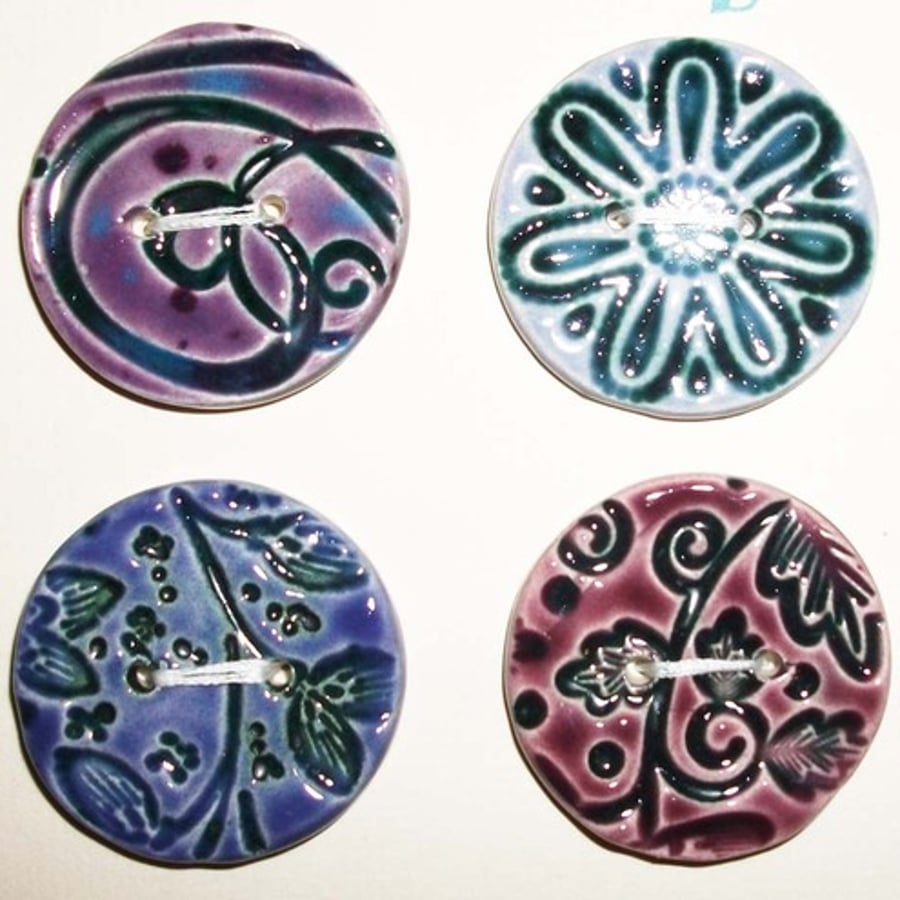set of four large ceramic buttons