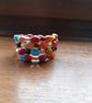 MULTI COLOURED HANDMADE CERAMIC MEMORY WIRE BRACELET. - Image 2