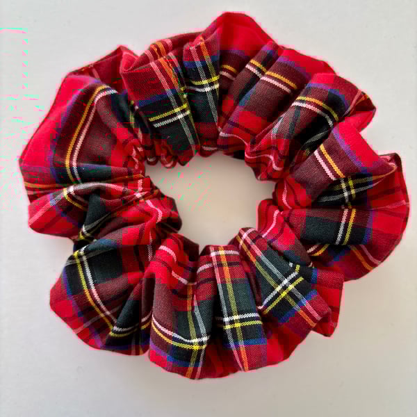 Cotton scrunchie hair accessory in festive bright red tartan