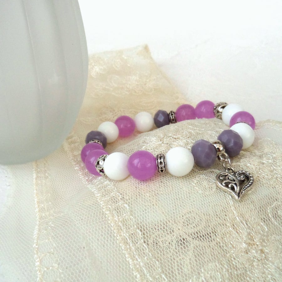 Pink and purple stretchy bracelet, with heart charm