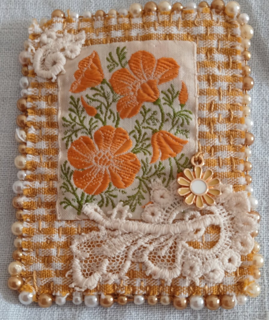 Golden marigolds textile brooch 