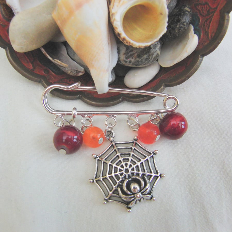 Red and Orange Beads and a Silver Spider Web Charm Kilt Pin Brooch