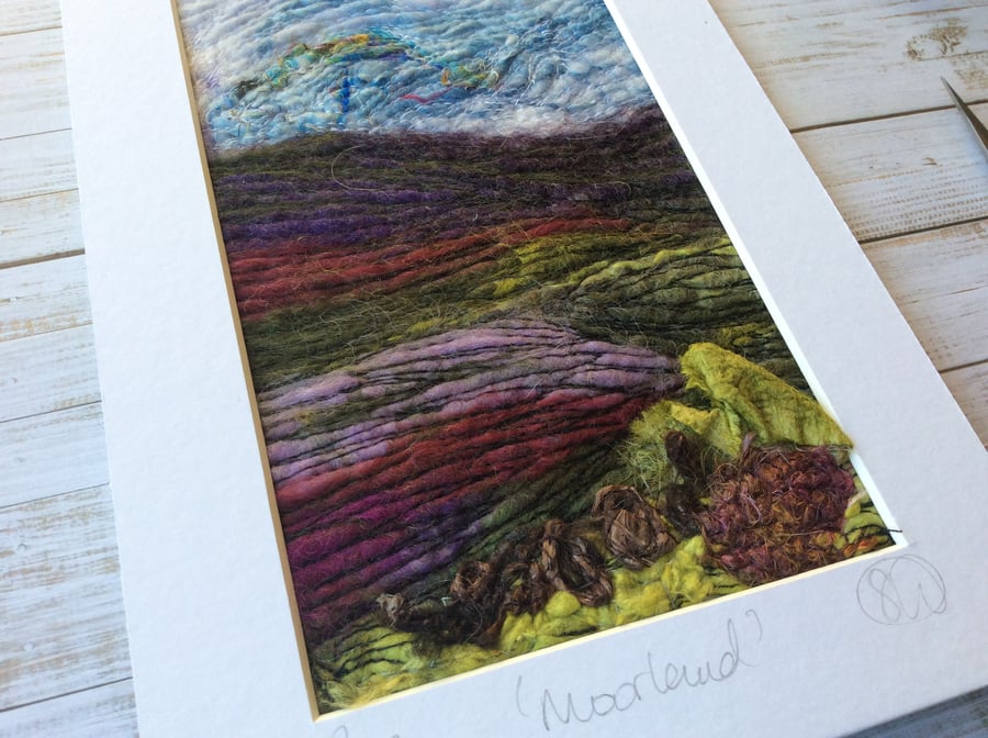 Embroidered moorland needle and wet felting felting landscape.