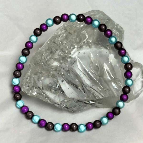 AL130c Purple, turquoise and black miracle bead anklet, 11.5"