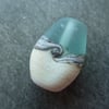 pale green and ivory lampwork glass focal bead