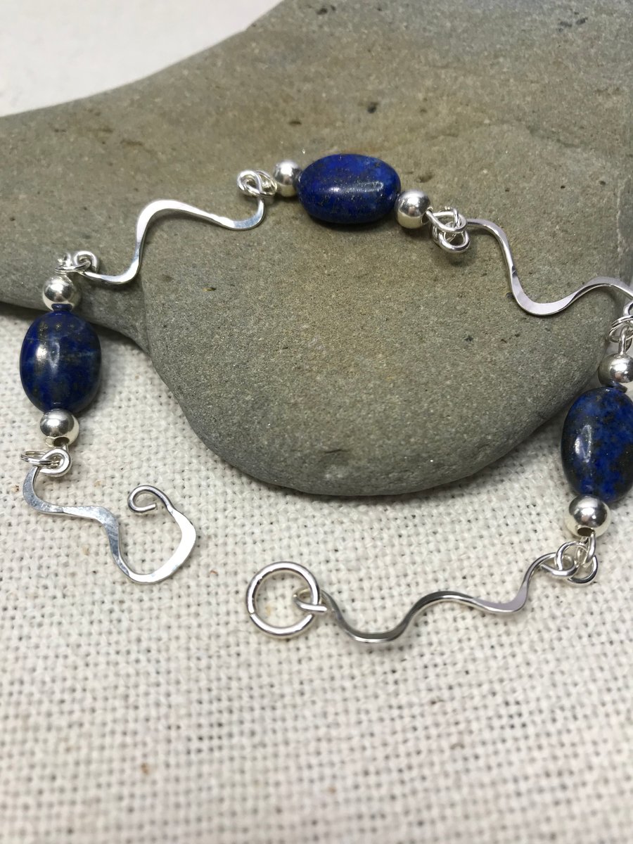 A handmade Sterling Silver bracelet with semi-precious Lapis Lazuli beads