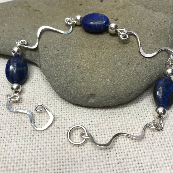 A handmade Sterling Silver bracelet with semi-precious Lapis Lazuli beads