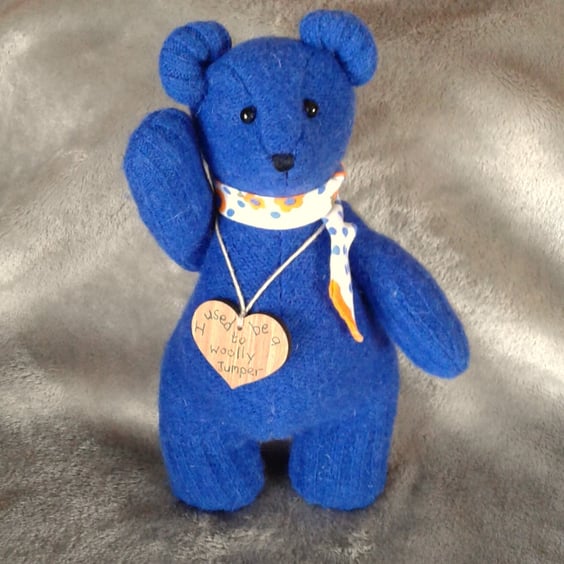 Teddy bear from repurposed blue woolly jumper with flowery neckerchief