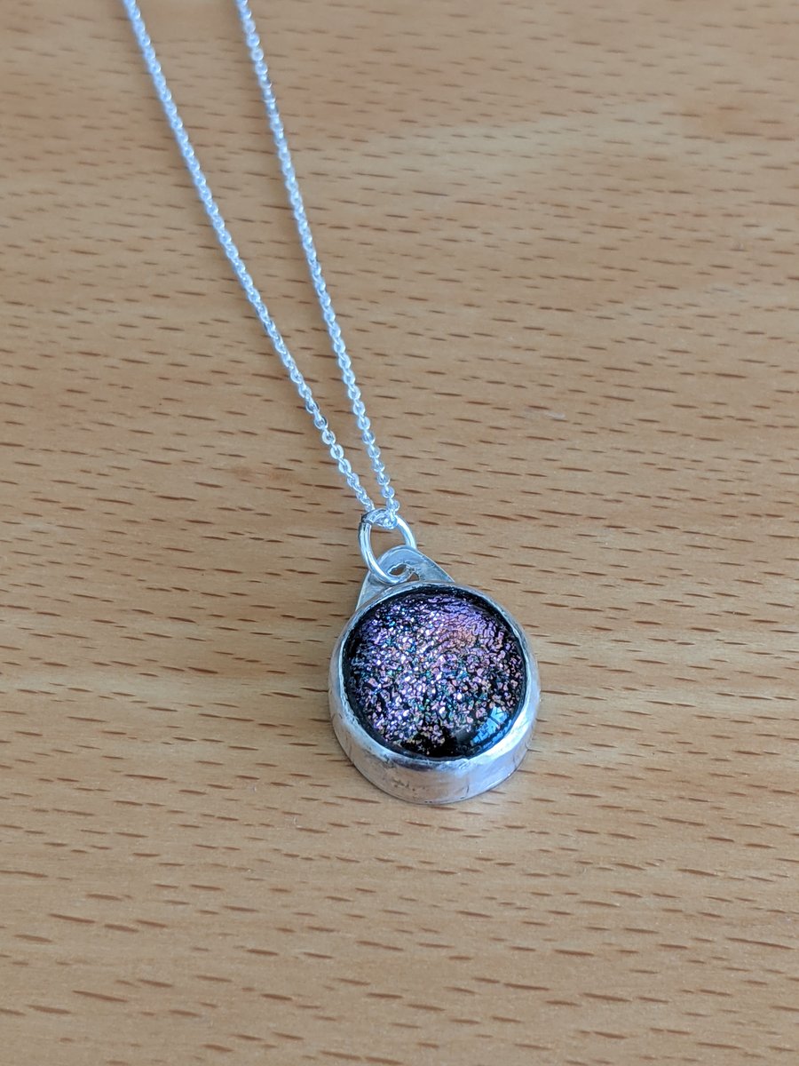 dichromatic glass set in silver pendant, on an adjustable silver chain