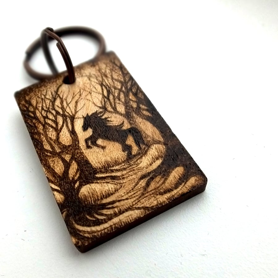 Woodland horse silhouette pyrography keyring, ready for personalisation.