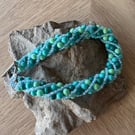 Blue and green beaded bracekwt
