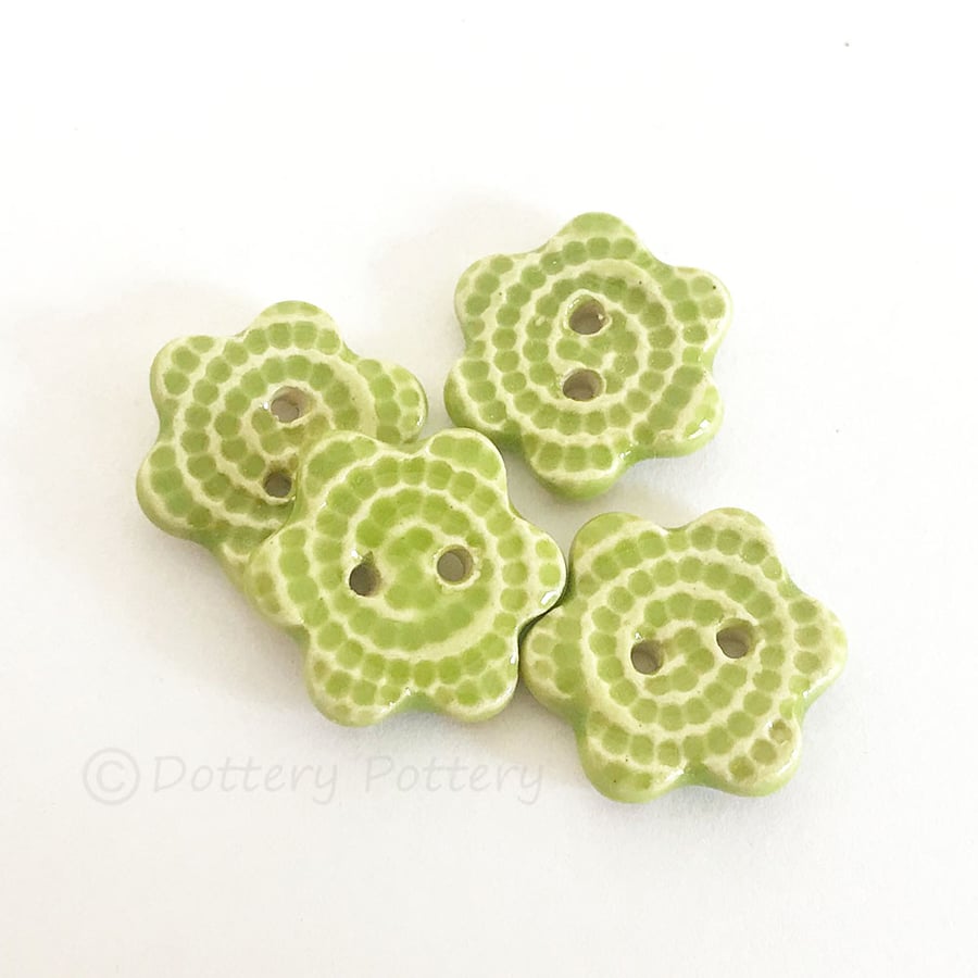 Set of four little green glazed flower shaped ceramic handmade buttons