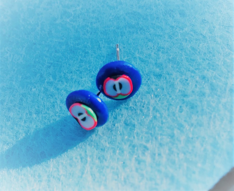 Apple polymer clay stud earrings (blue background)