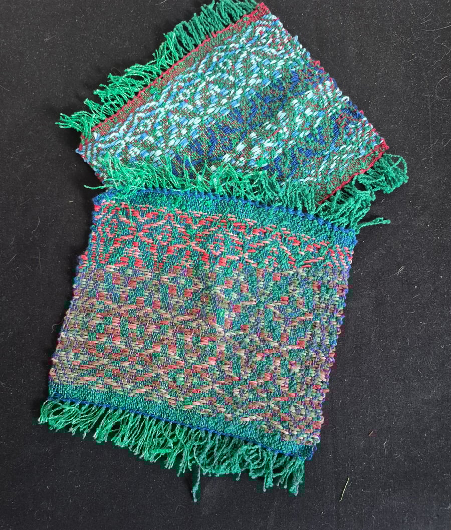 34 A Pair Of Mug Mats.