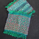 34 A Pair Of Mug Mats.