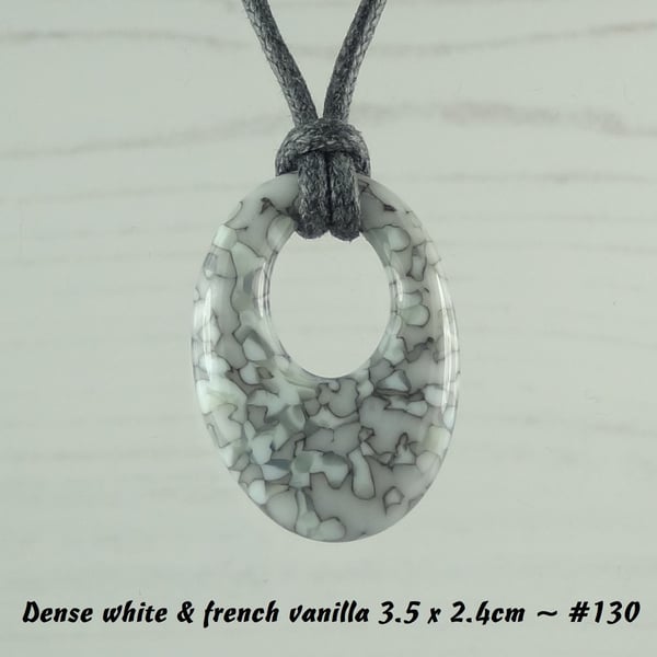 Fused glass pendant on a waxed cotton cord, off-set oval, grey or blue