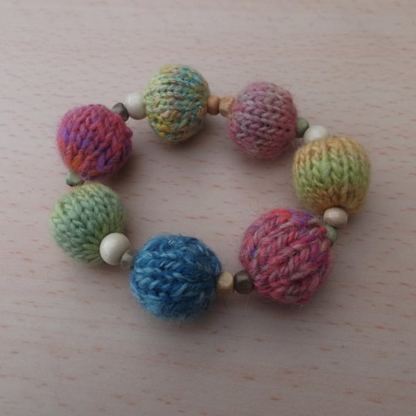 Hand knitted bracelet