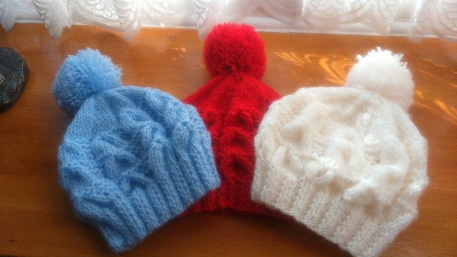 Aran babies hats hand knitted age 0-6 months - available in a variety of colours