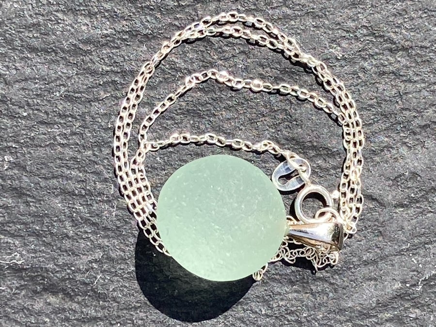 Sterling silver and sea-green codd marble pendant