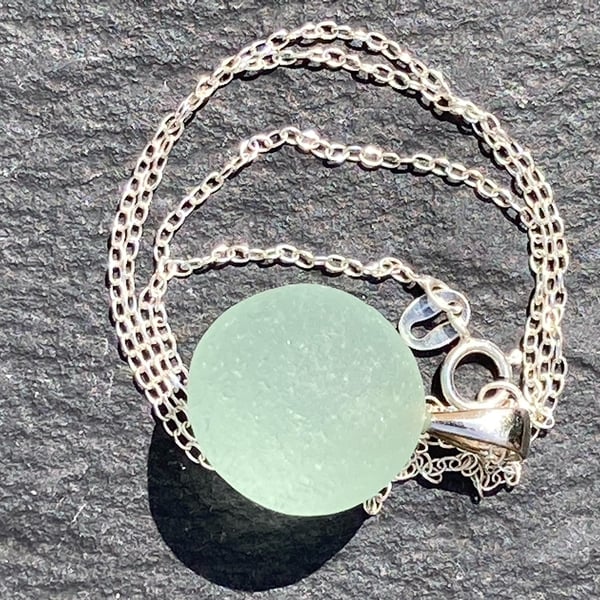 Sterling silver and sea-green codd marble pendant