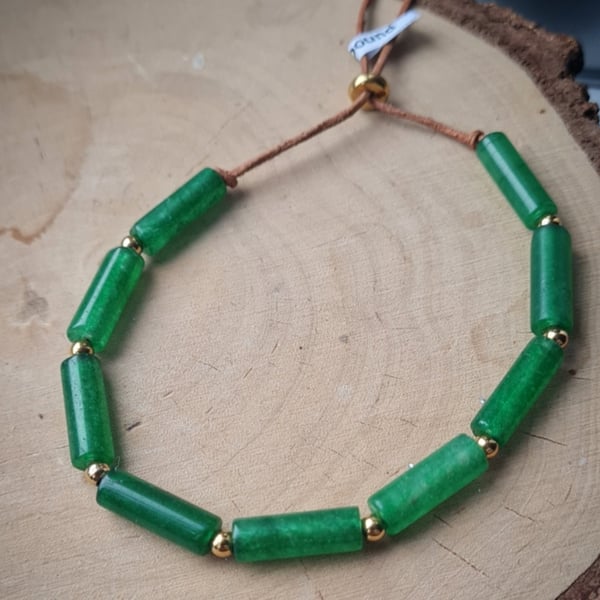 Green Jade stone on a strap