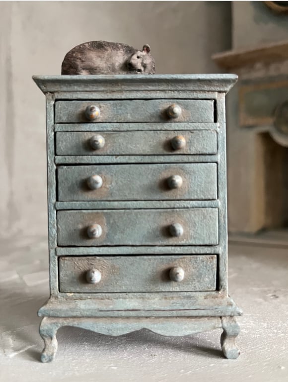 1:12 scale dolls house chest of drawers with tiny paper mache hedgehog