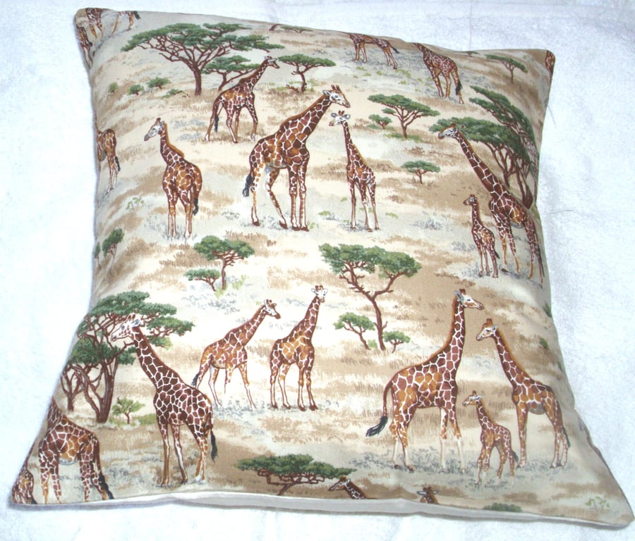 On Safari  Giraffes on grassy plain cushion 
